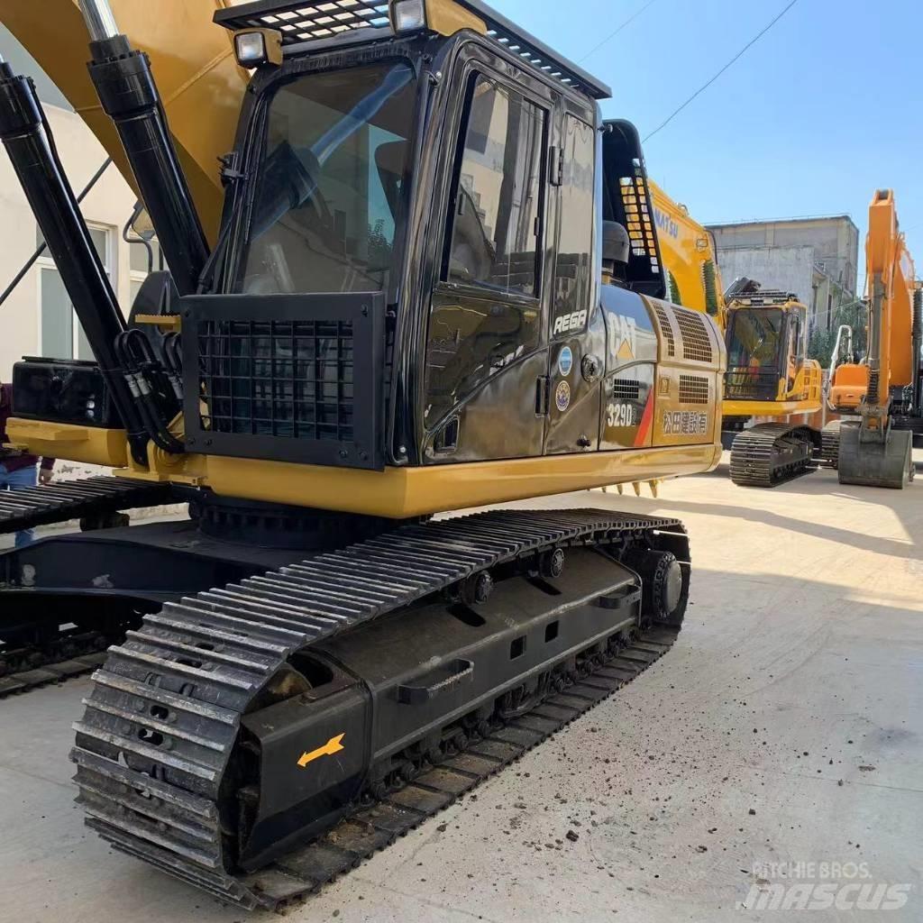 CAT 329E Pásová rýpadla