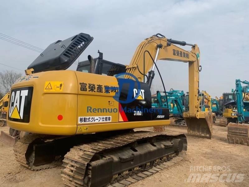 CAT 318DL Pásová rýpadla