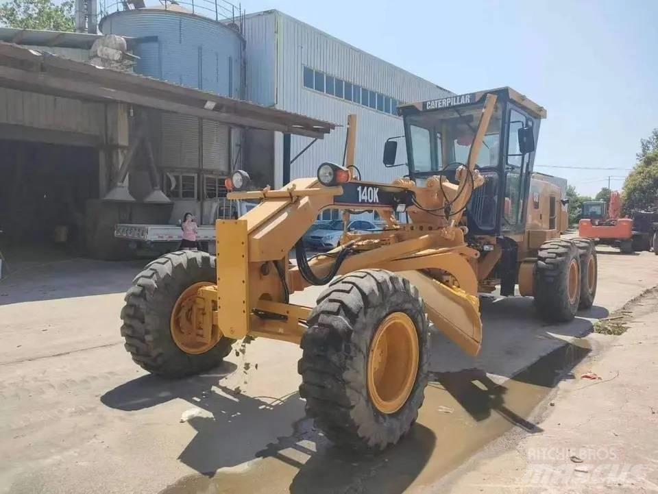 CAT 140K Grejdry