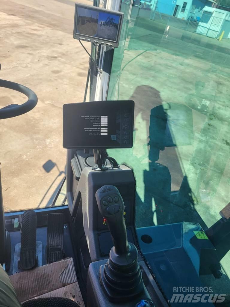 Fuchs MHL 331 Stroje pro manipulaci s odpadem