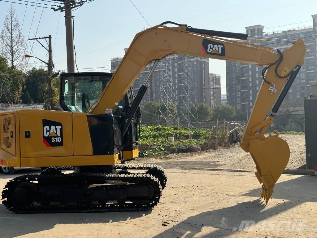 CAT 310 Pásová rýpadla