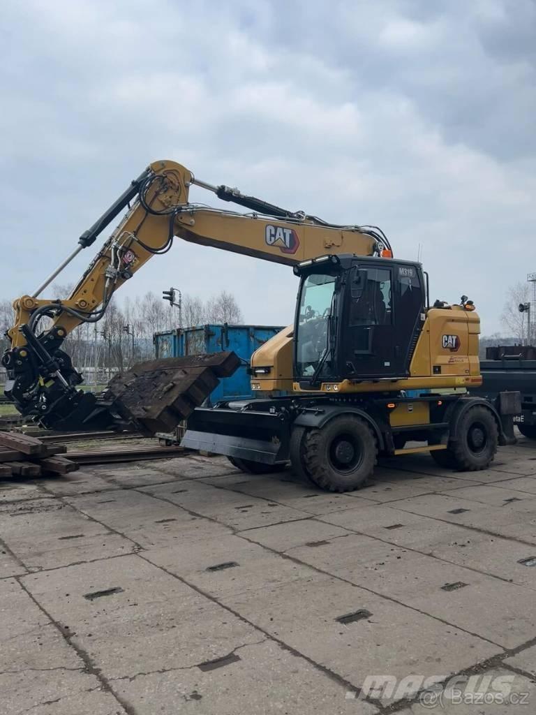 CAT M 319 Kolová rýpadla