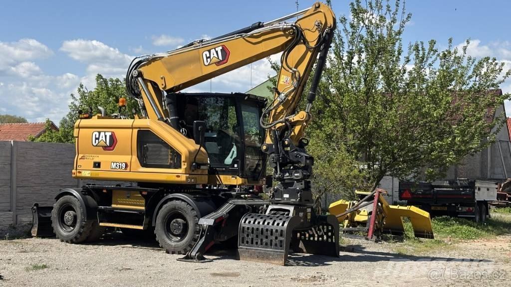 CAT M 319 Kolová rýpadla