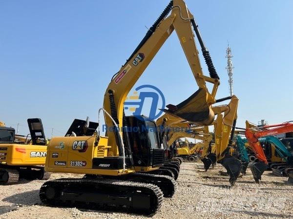 CAT 313 Midi rýpadla 7t - 12t