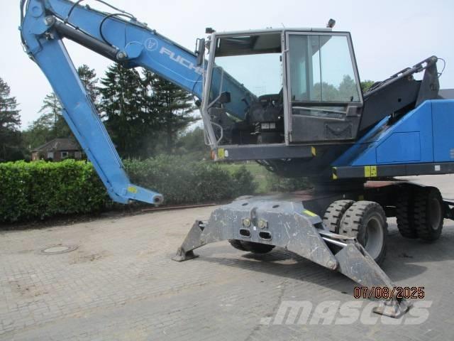 Fuchs MHL 320 Stroje pro manipulaci s odpadem