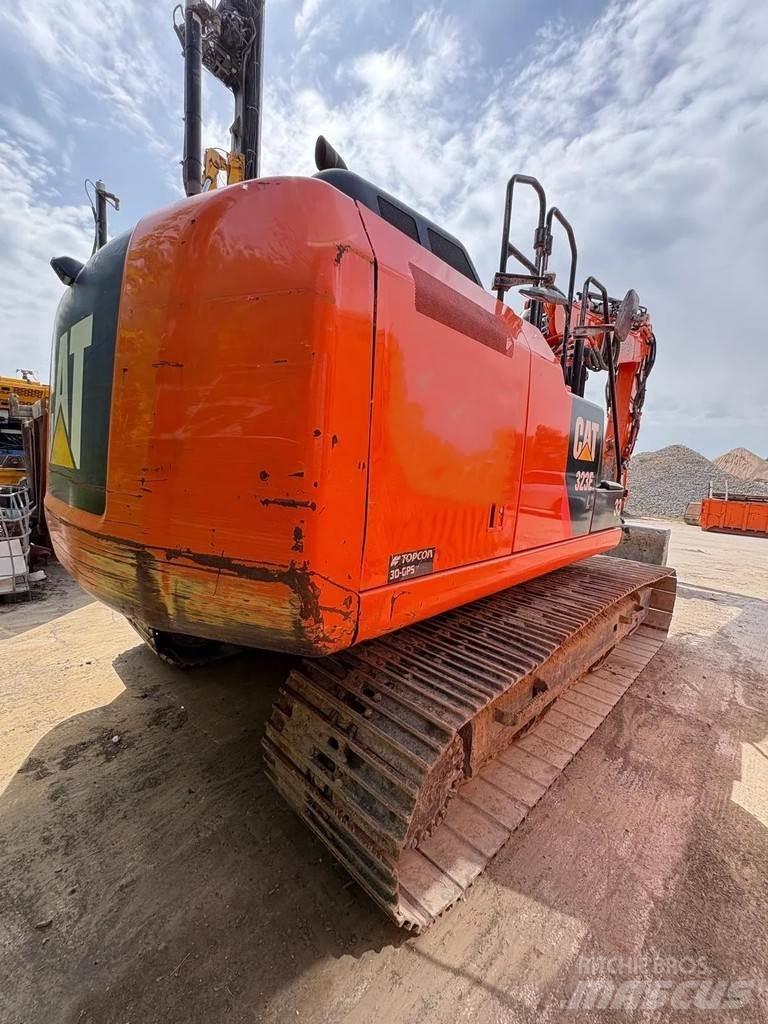 CAT 323E Pásová rýpadla