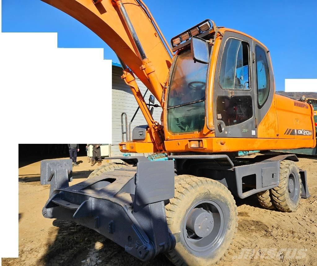 Doosan DX 210 W Kolová rýpadla