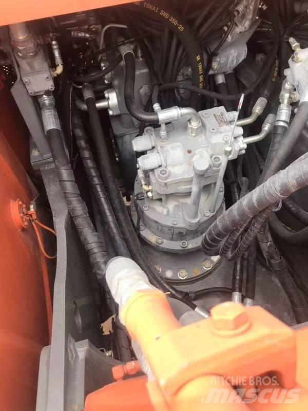 Hitachi zx210 Pásová rýpadla