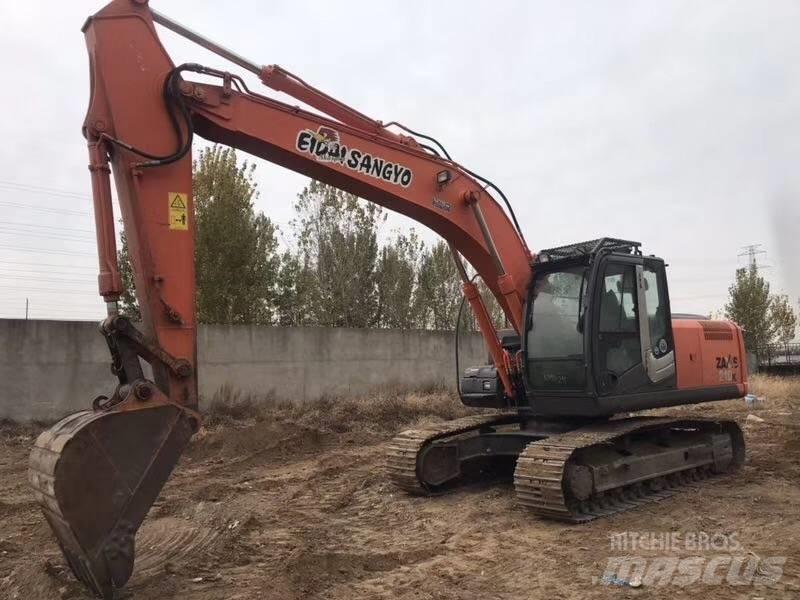 Hitachi zx210 Pásová rýpadla