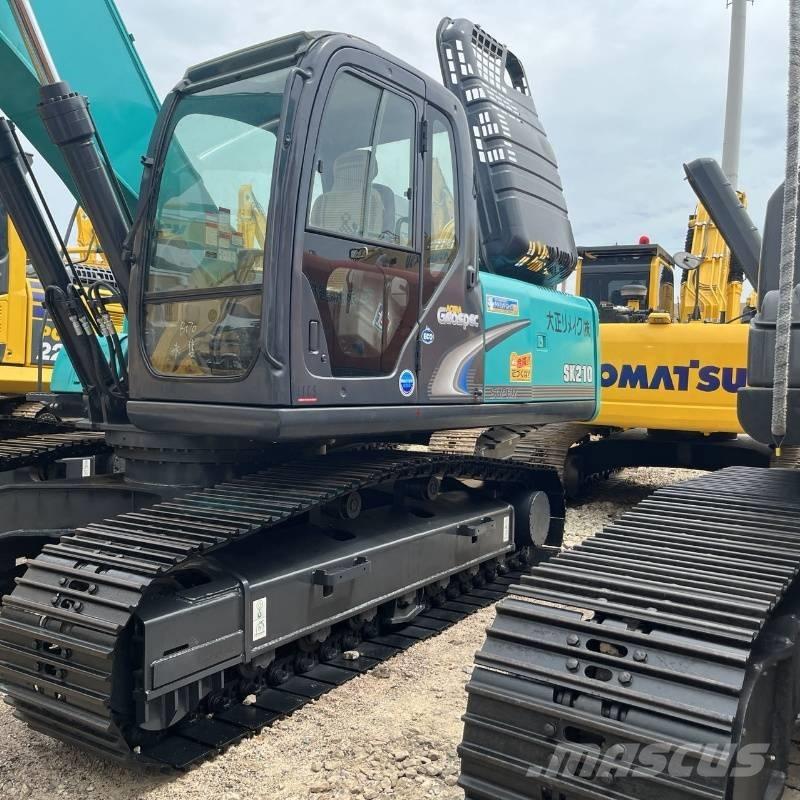 Kobelco SK 210 Pásová rýpadla