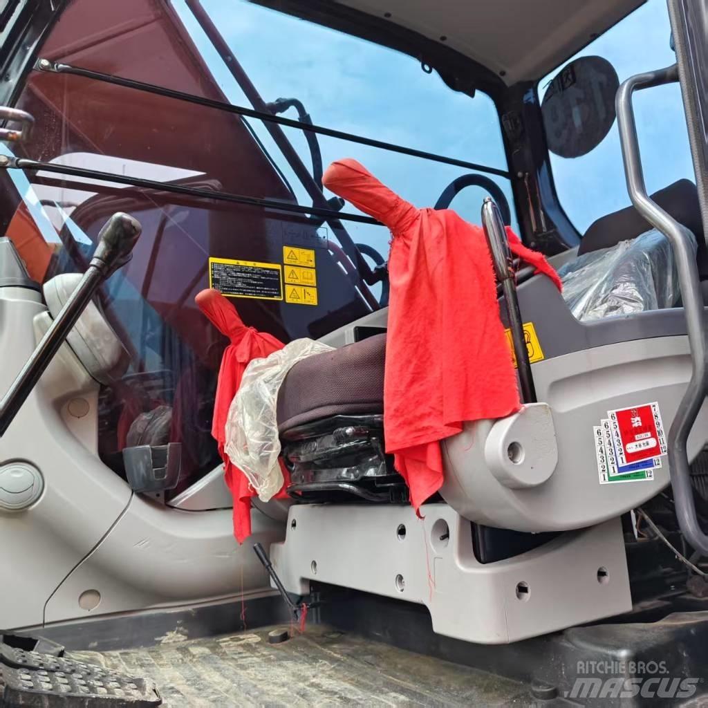 Hitachi ZX 210 Pásová rýpadla