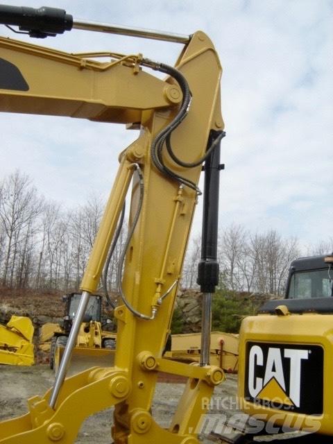 CAT 311F Pásová rýpadla