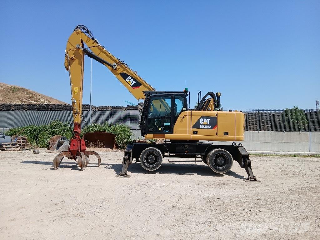 CAT MH 3022 Stroje pro manipulaci s odpadem