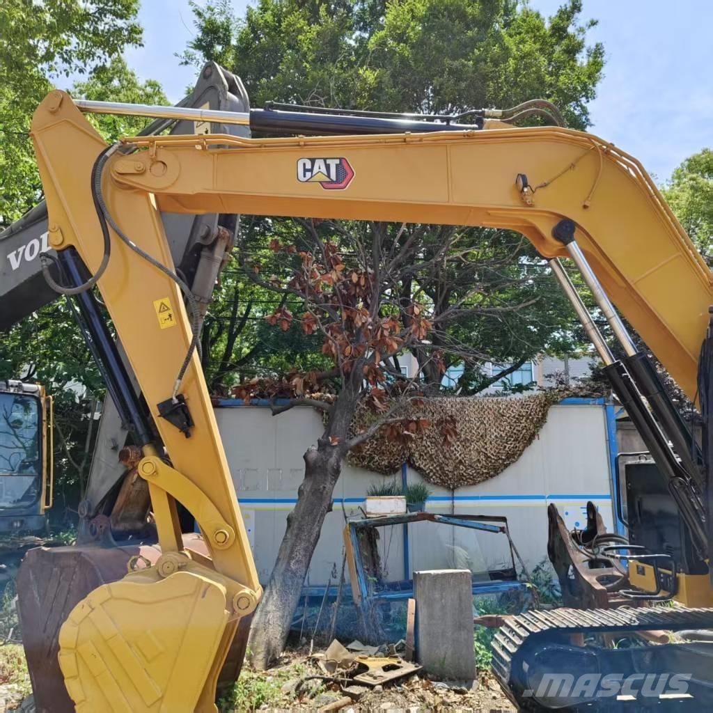 CAT 310 Pásová rýpadla