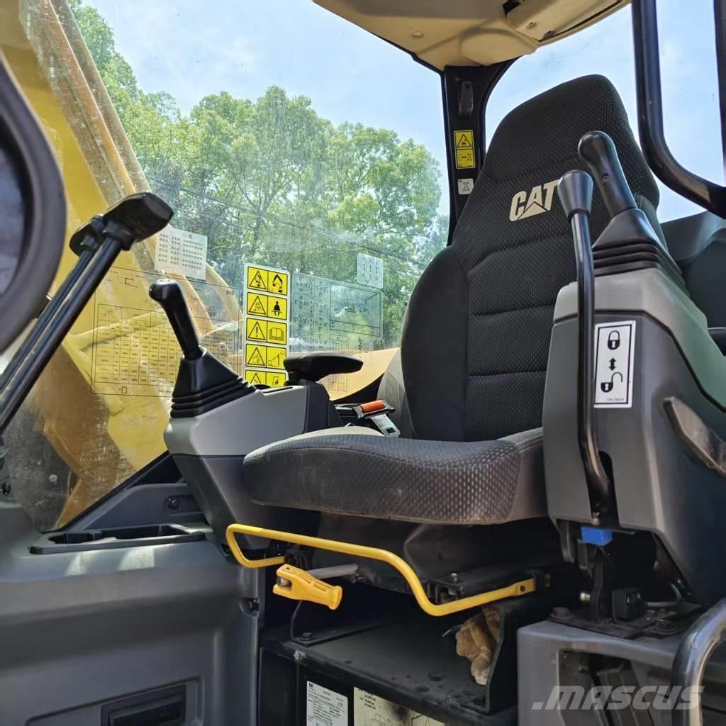 CAT 310 Pásová rýpadla