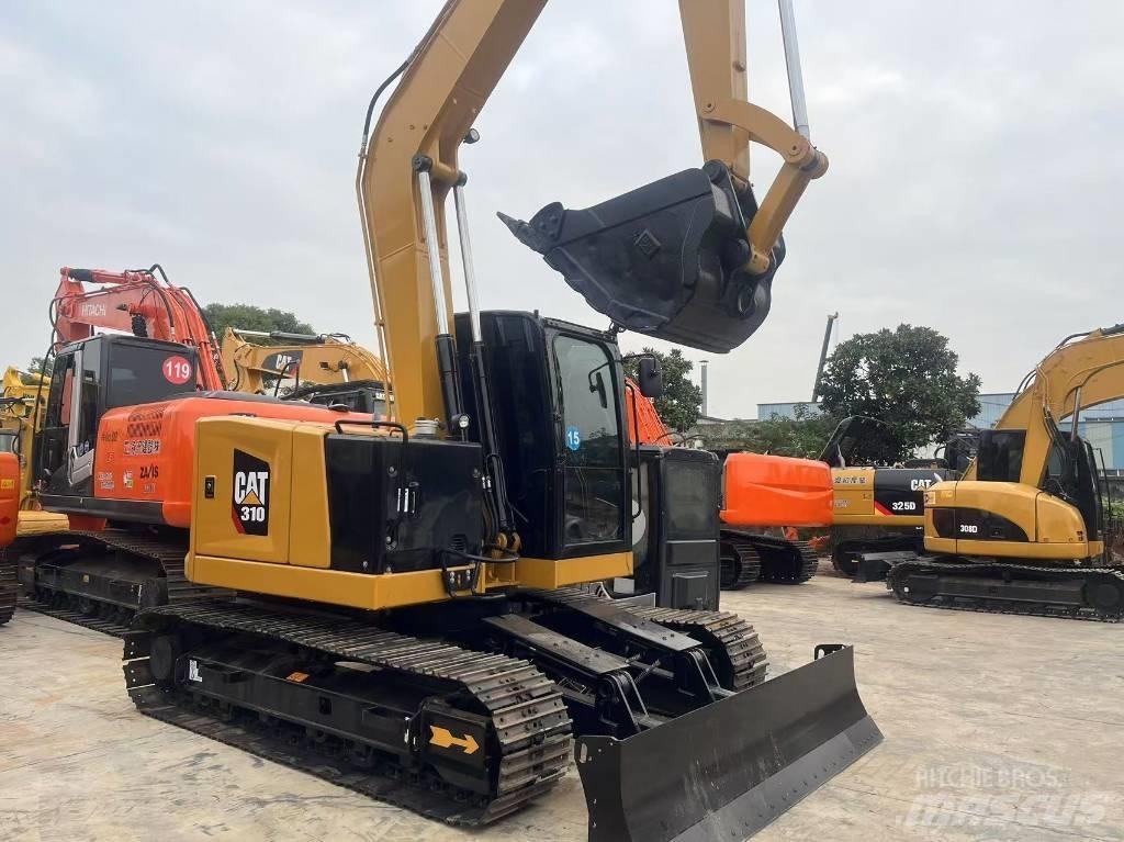 CAT 310 Pásová rýpadla