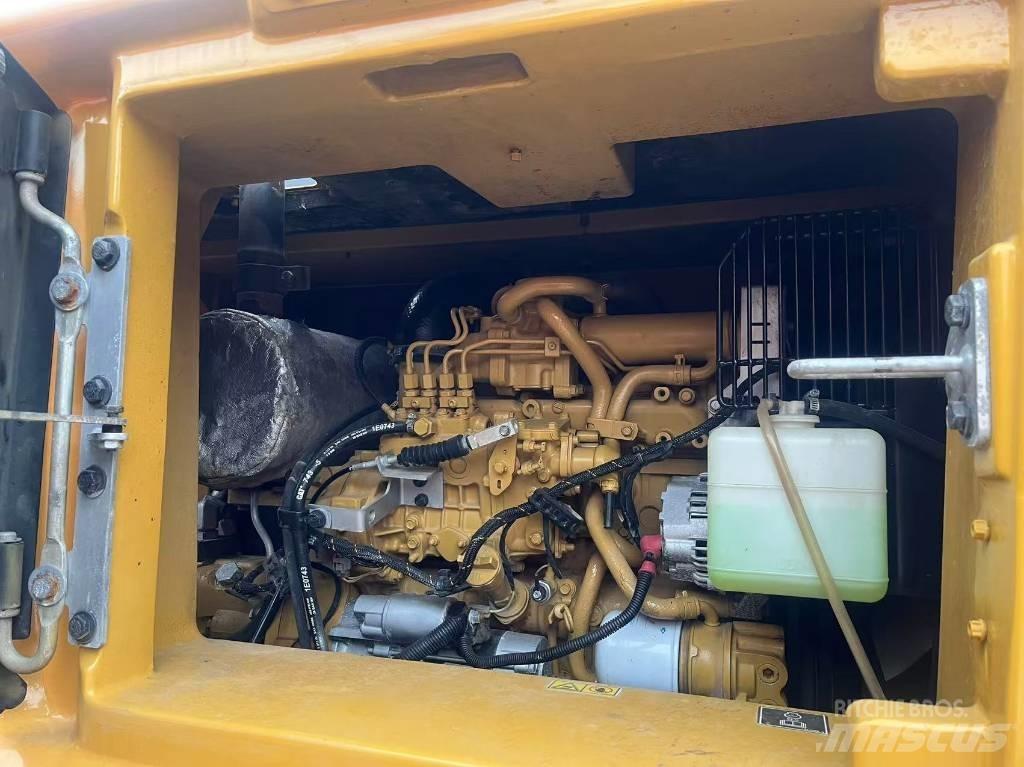 CAT 310 Pásová rýpadla