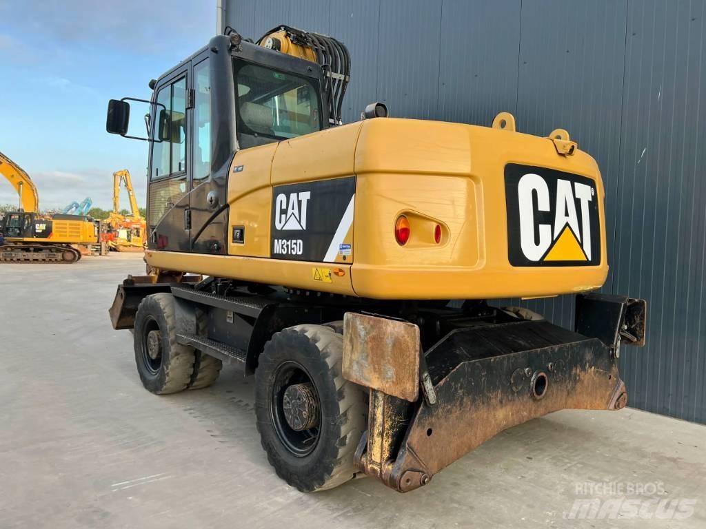 CAT M315D Kolová rýpadla