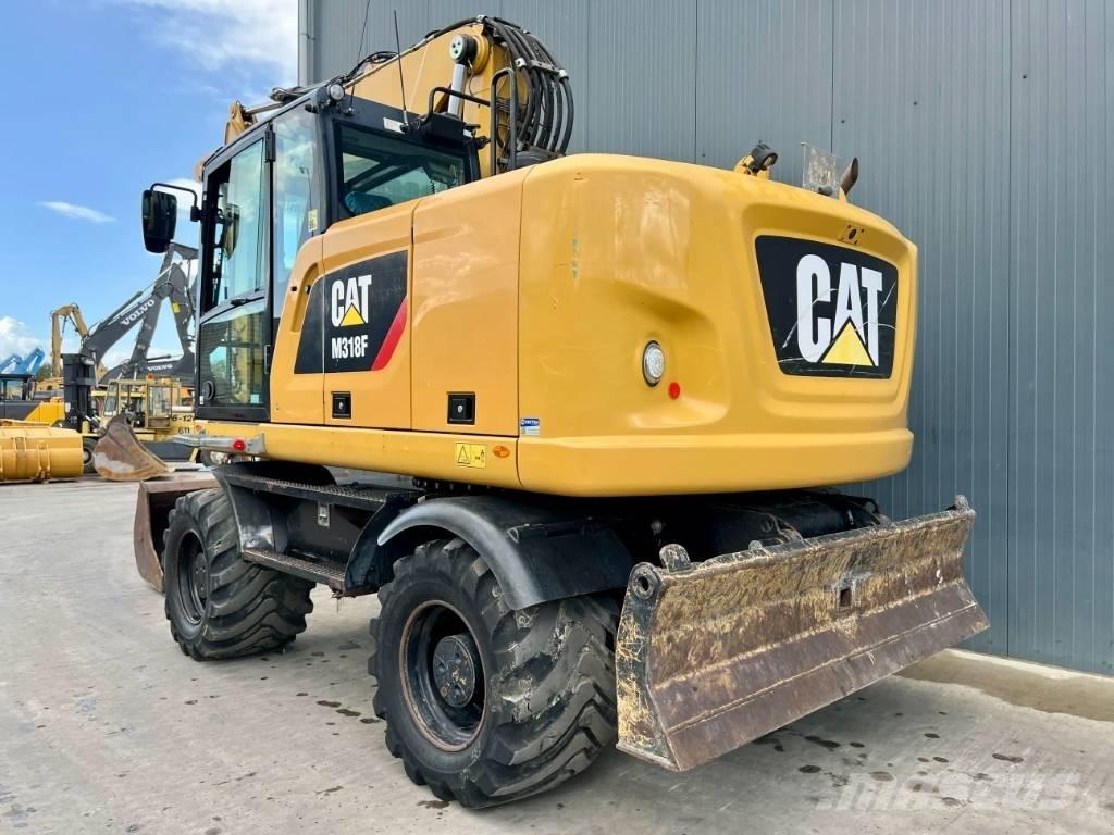 CAT M318F Kolová rýpadla