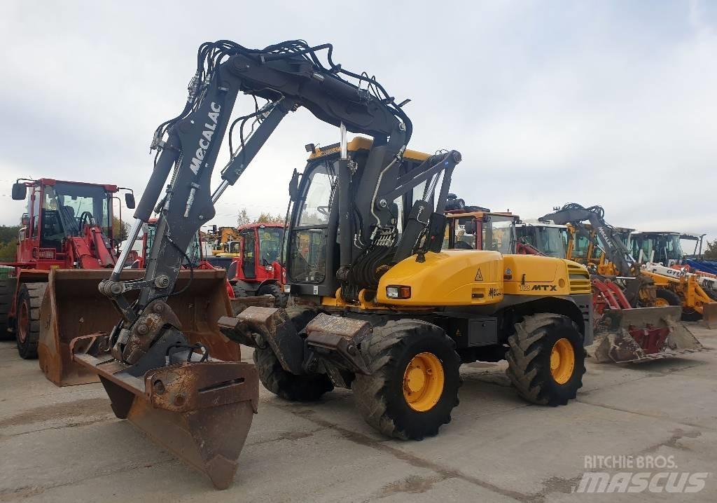 Mecalac 12 M TX Kolová rýpadla