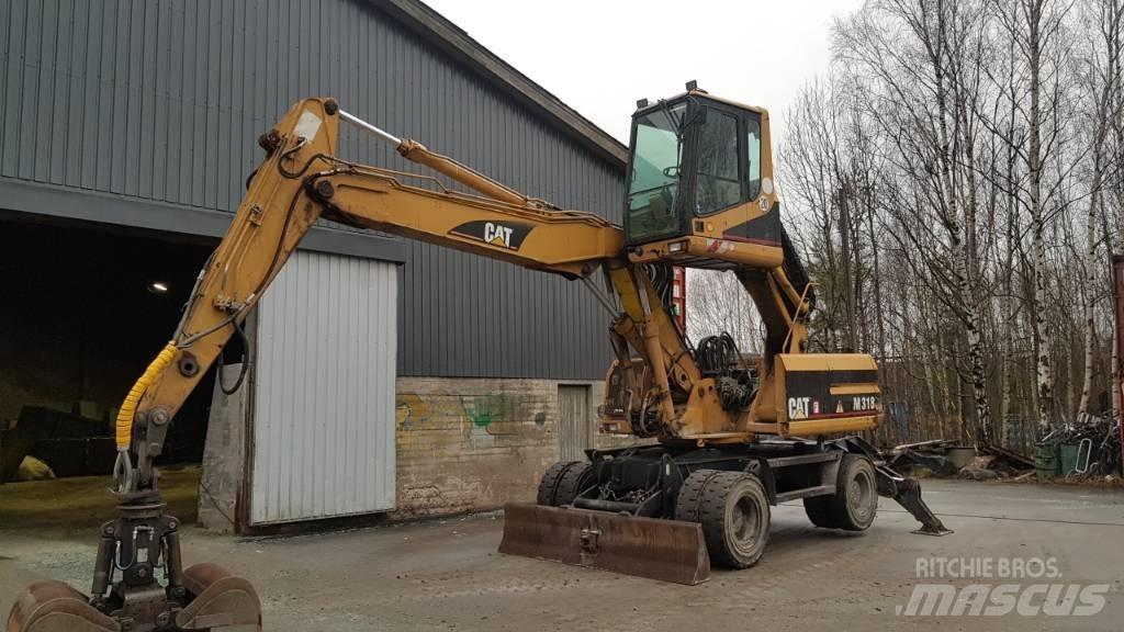 CAT M 318 Stroje pro manipulaci s odpadem