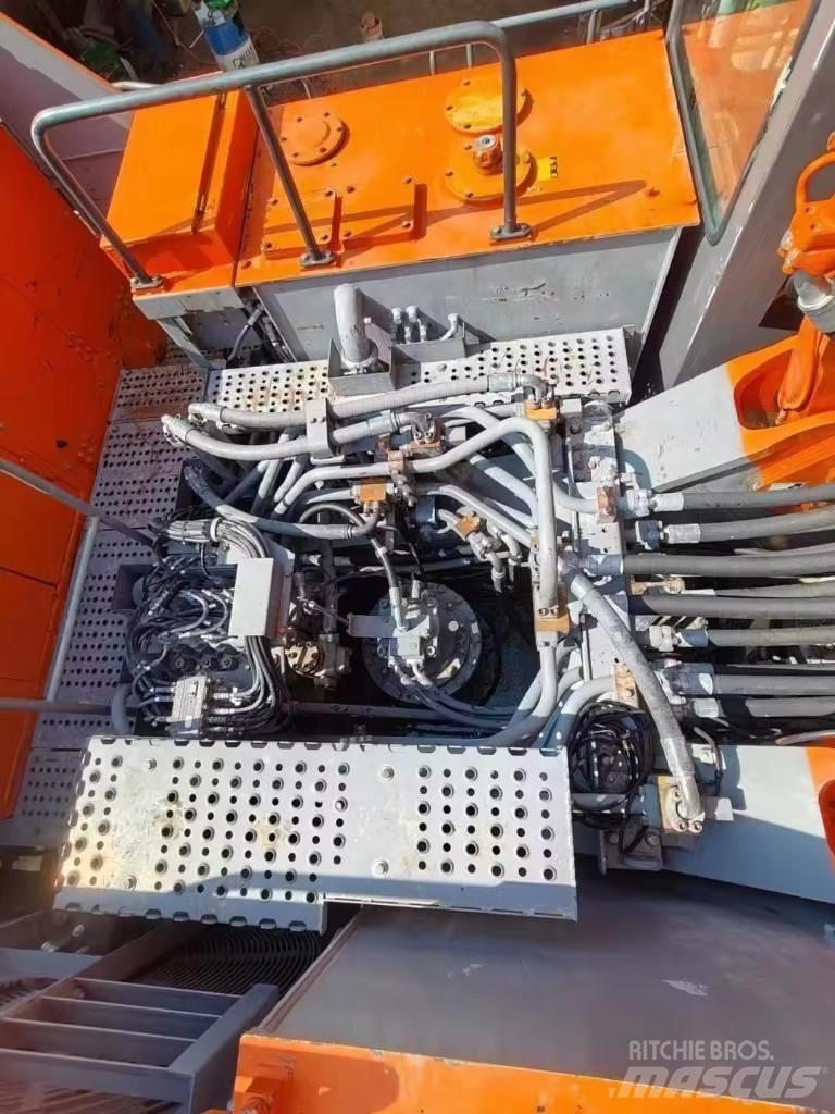 Hitachi EX 1200 Pásová rýpadla