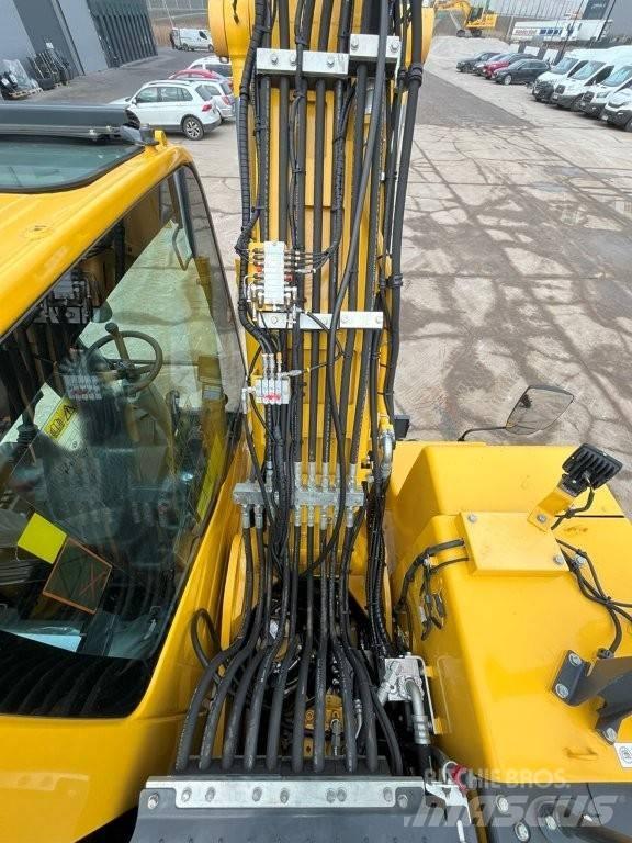 Komatsu PW160-11 Kolová rýpadla