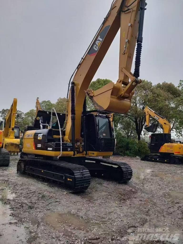 CAT 323D2 Pásová rýpadla