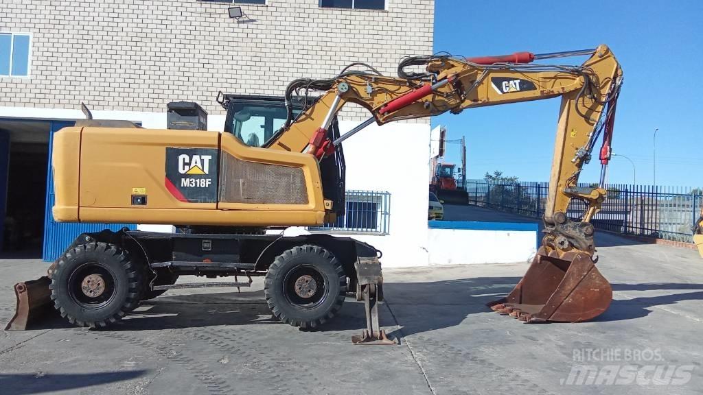 CAT M318F Kolová rýpadla