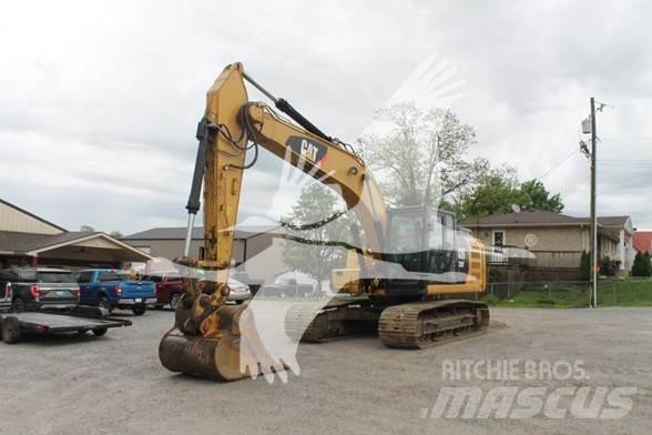 CAT 323FL Pásová rýpadla