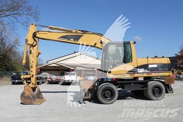 CAT M318C Kolová rýpadla