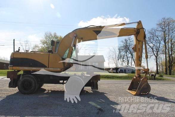 CAT M318C Kolová rýpadla