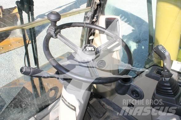 CAT M318C Kolová rýpadla