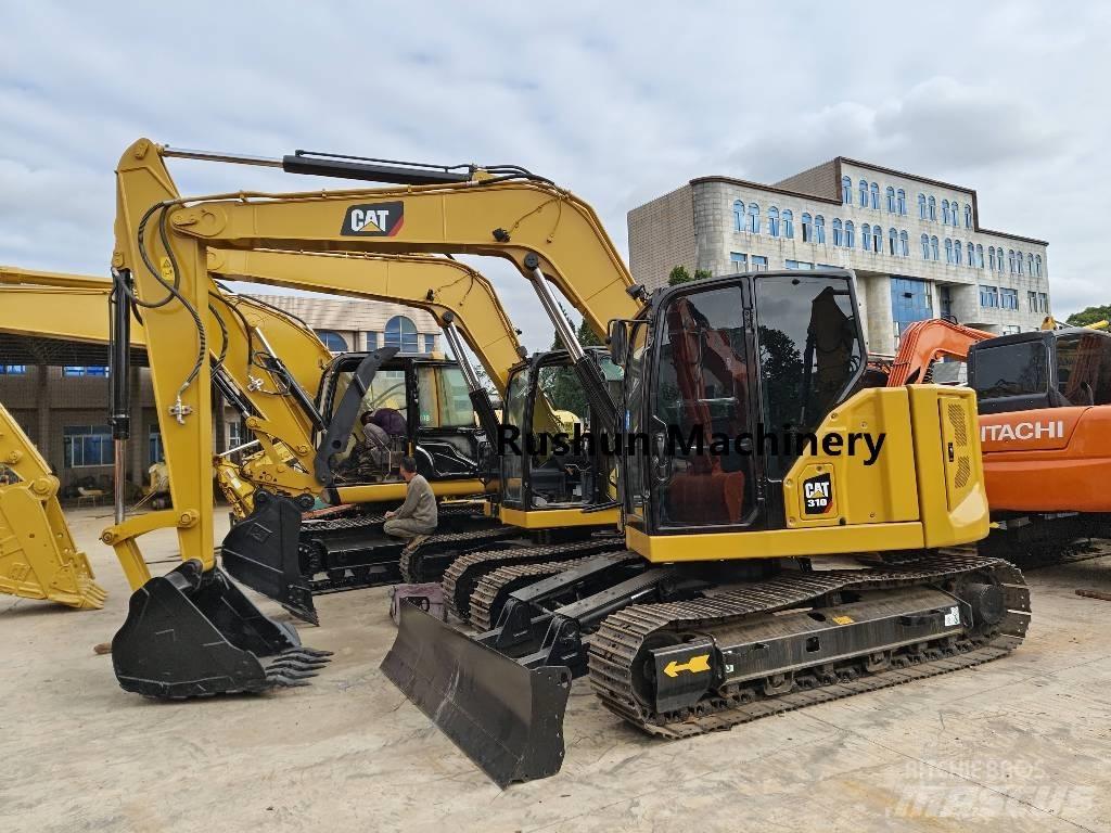 CAT 310 Pásová rýpadla