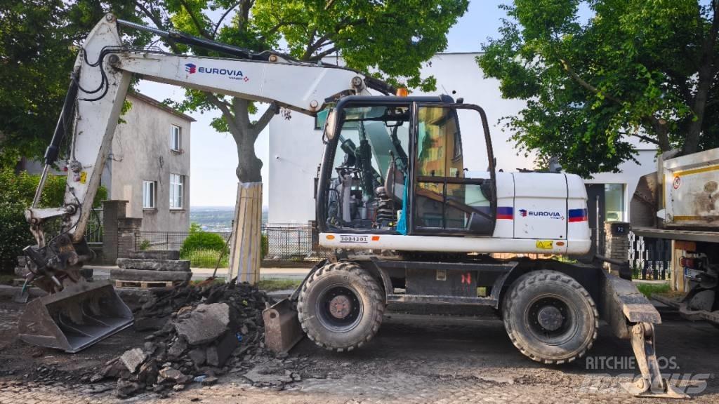 CAT 313 D Kolová rýpadla