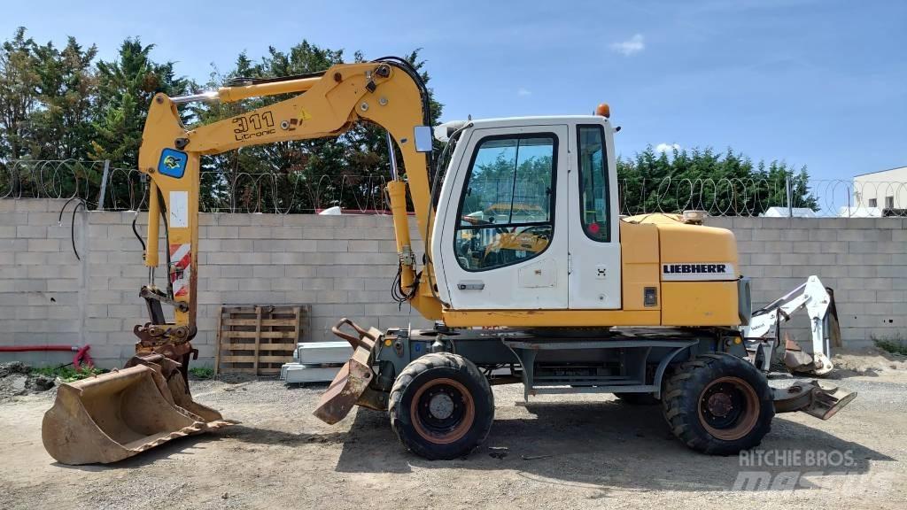 Liebherr A 311 Kolová rýpadla