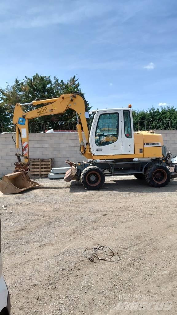 Liebherr A 311 Kolová rýpadla