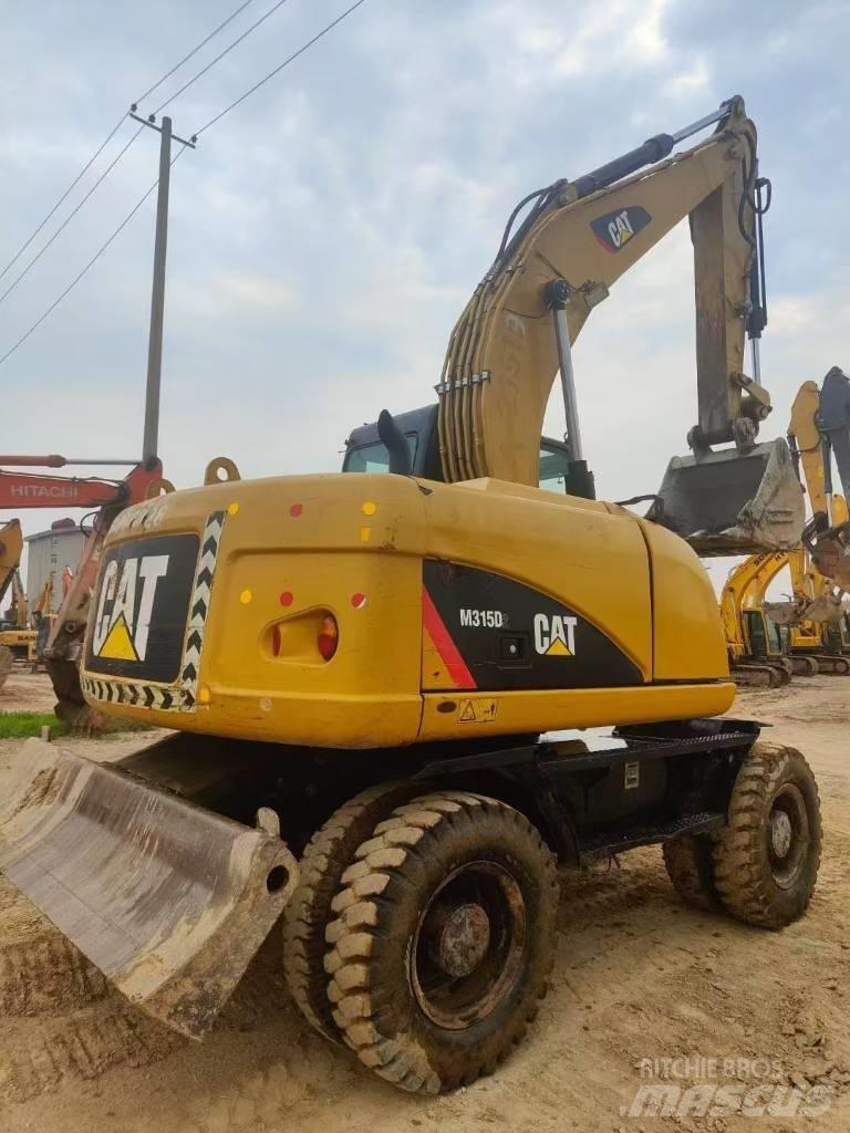 CAT M315D2 Pásová rýpadla