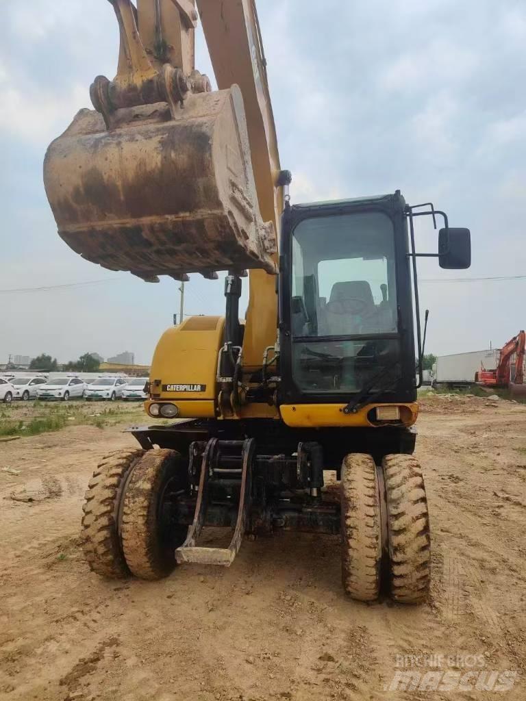 CAT M315D2 Pásová rýpadla