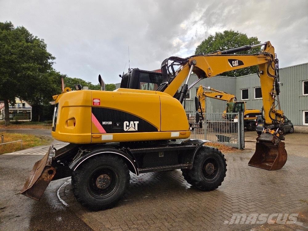 CAT M313D Kolová rýpadla