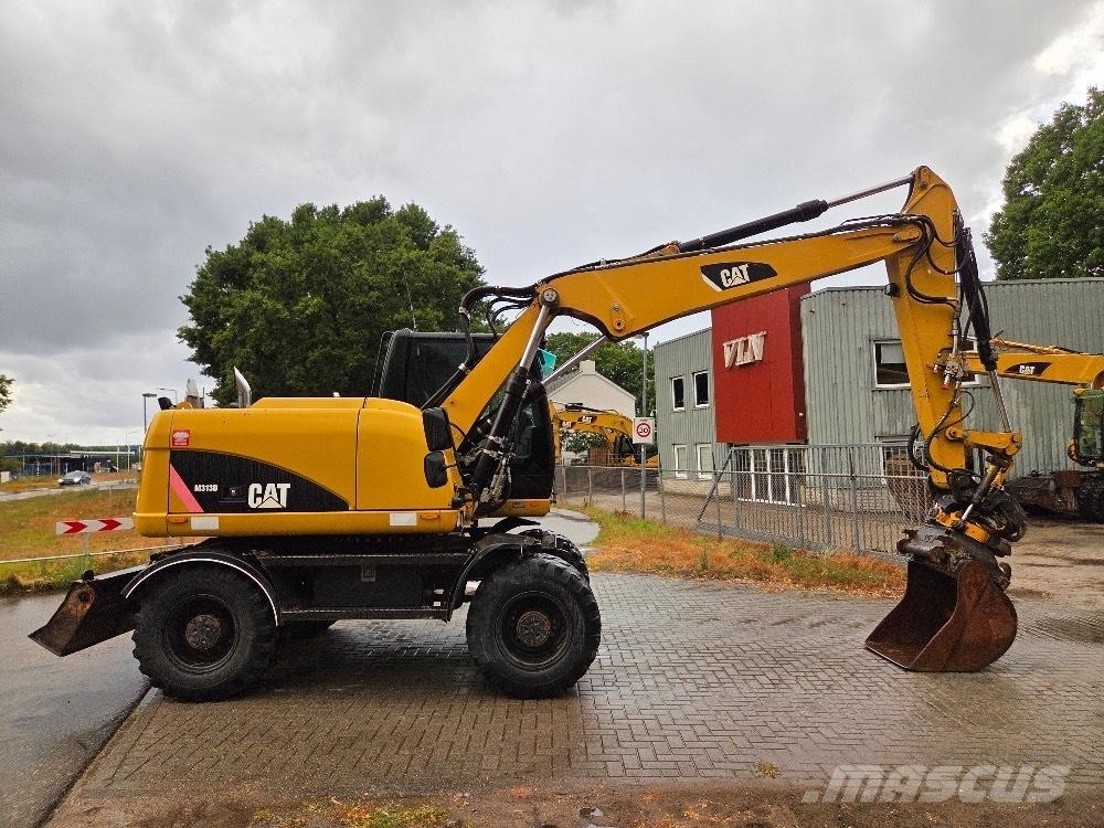 CAT M313D Kolová rýpadla