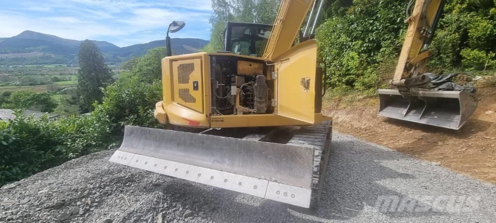 CAT 310 Pásová rýpadla