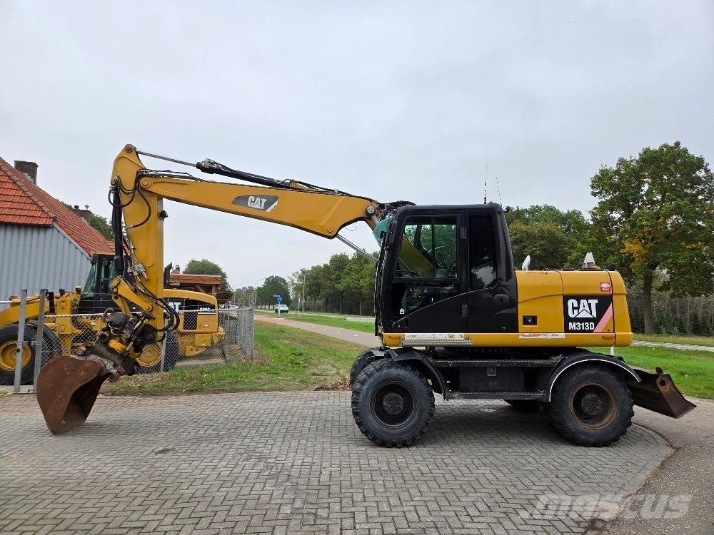 CAT M313D Kolová rýpadla