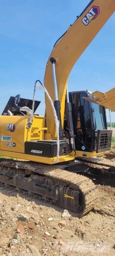 CAT 313 Midi rýpadla 7t - 12t