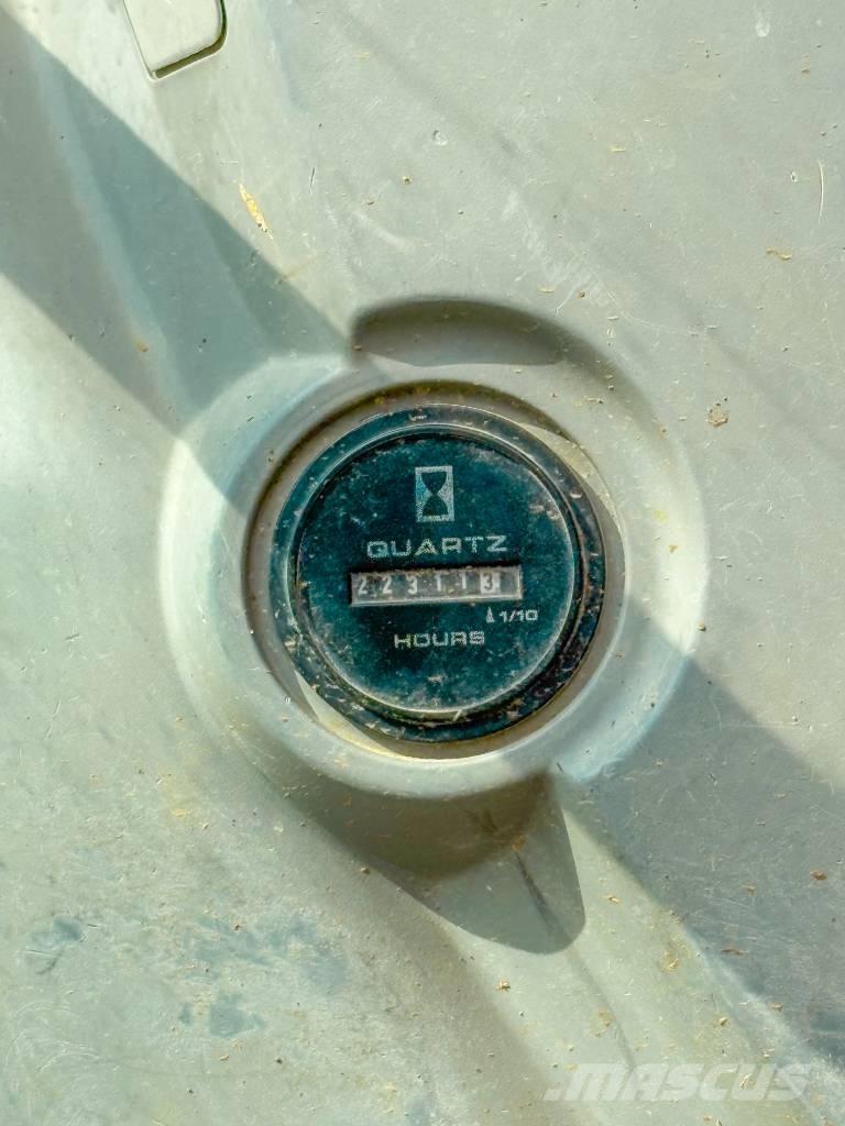 New Holland E 245 B Pásová rýpadla