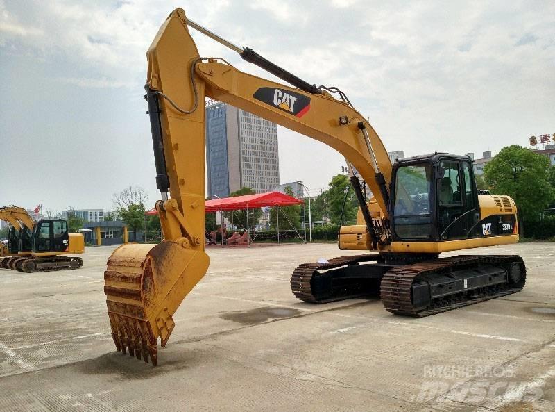 CAT 323 Pásová rýpadla