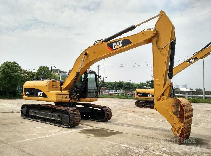 CAT 323 Pásová rýpadla