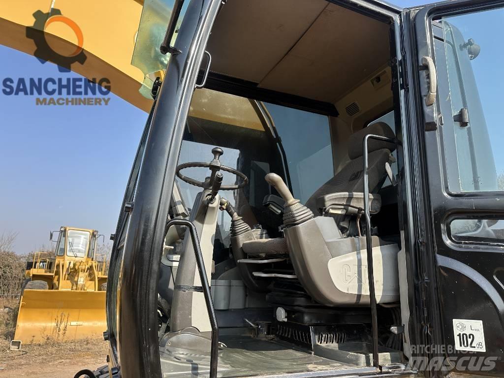 CAT M320D Kolová rýpadla
