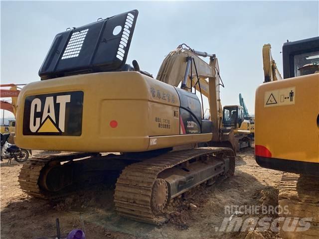 CAT 323D Pásová rýpadla