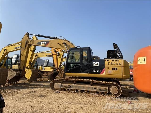 CAT 323D Pásová rýpadla